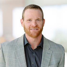 Professional headshot of Josh Edwards.