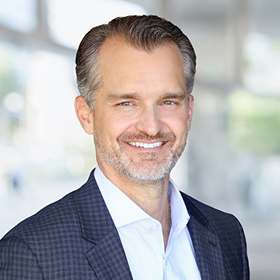 Professional headshot of Scott Dragicevich.